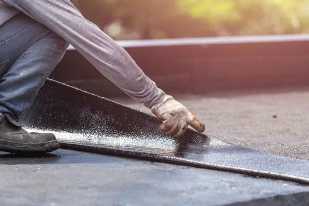 Professional Waterproofing technician working in Ludington, MI
